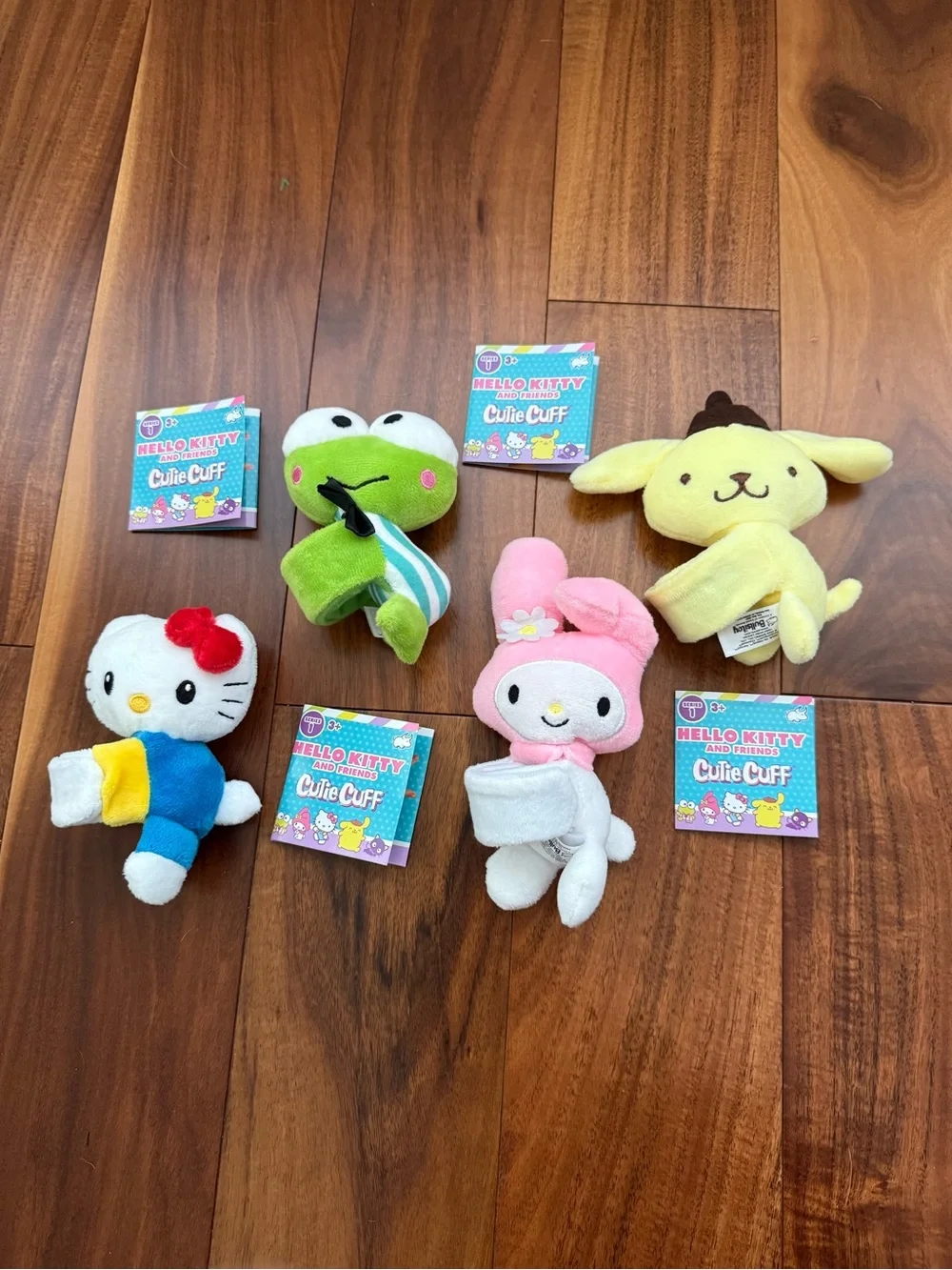 Hello Kitty Sanrio Cutie Cuffs My Melody Keroppi Pompompurin Bundle of 4 Plush